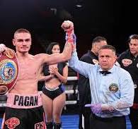  L'emergente campione Nabo Joshua Pagan in azione a  Grand Rapids.C'è il Wbc leggeri femminile
